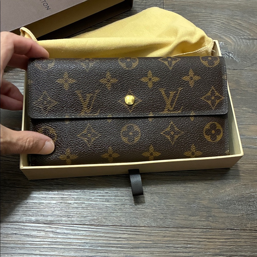 Louis Vuitton Sarah International Trifold Wallet